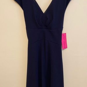 Navy dress with cutout back. NWT!! Size 14